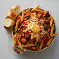 Baked Penne with Spicy Sausage,Italian veg,Garlic Bread 