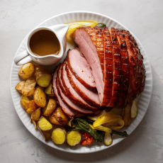  Maple Glaze Roasted Ham with Lyonnaise potatoes, Steamed Seasonal Vegetables 